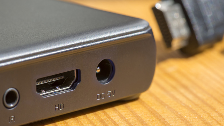 HDMI port and cable with set-top box in view illustrating the standard.