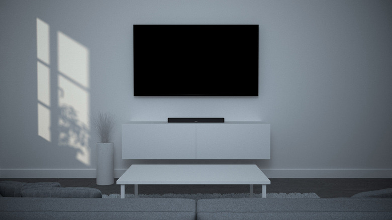 Soundbar sits underneath a flat screen with no subwoofer