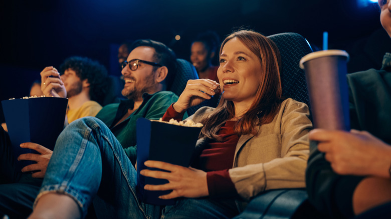 People watching a movie in a movie theater.