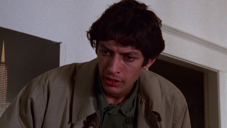 Jack (Jeff Goldblum) hunched over in "Invasion of the Body Snatchers"