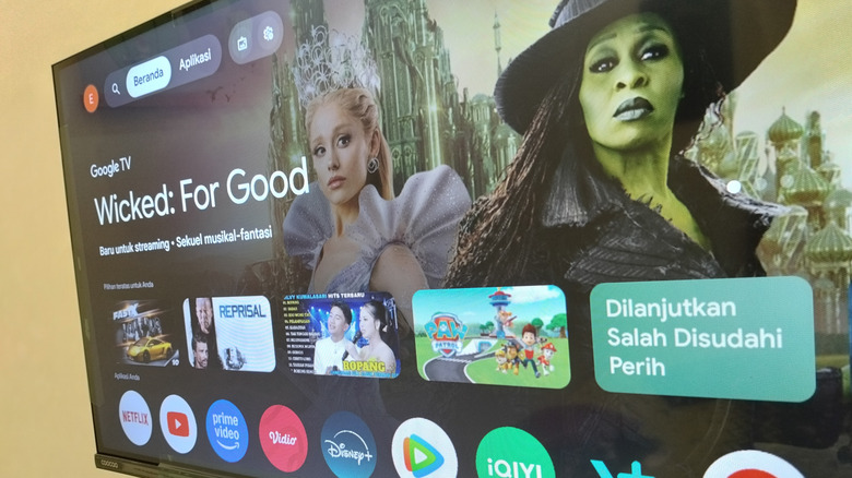 Google TV operating system on a TV mounted to a wall