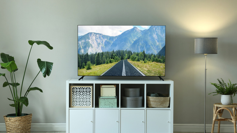 TV set on console in a room