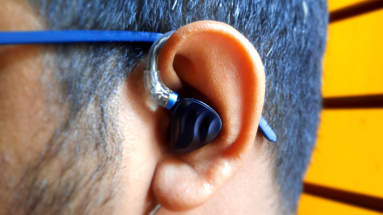 Close-up of ean ar with an IEM inserted