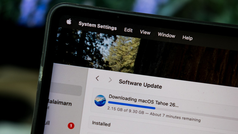 MacBook installing macOS 26 Tahoe update