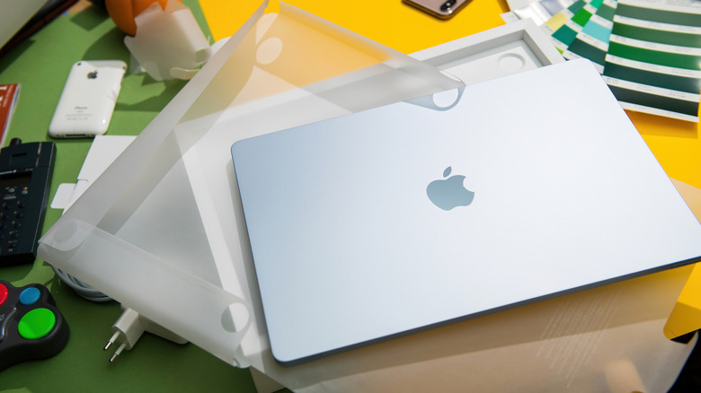 A new MacBook Pro removed from package box