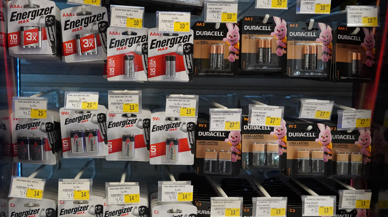 Duracell and Energizer alkaline batteries in a supermarket
