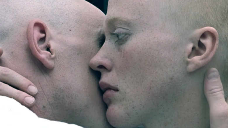 THX (Robert Duvall) embracing LUH 3417 (Maggie McOmie) in 