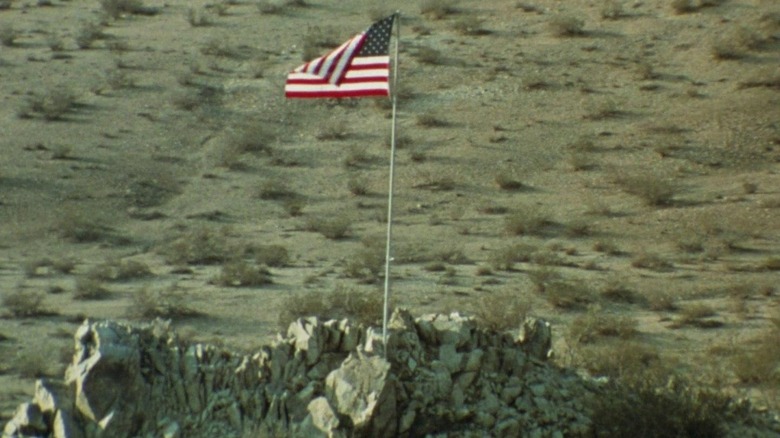 An American flag in the middle of the desert in "Punishment Park."
