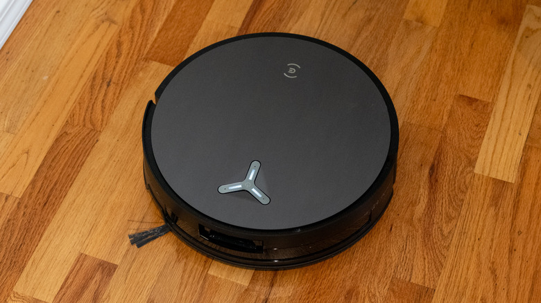 Ecovacs Deebot X11 Omnicyclone on a wooden floor