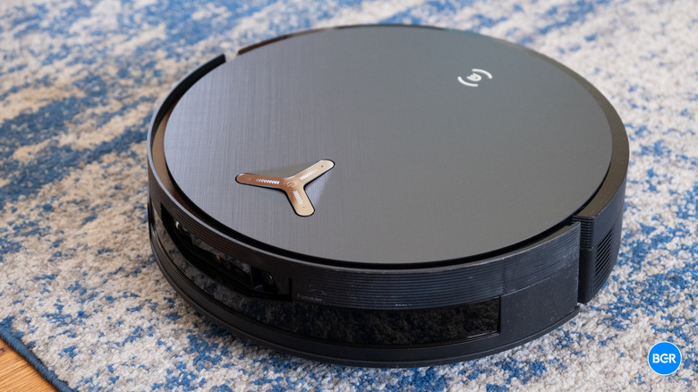 Ecovacs Deebot X12 OmniCyclone vacuum on a rug