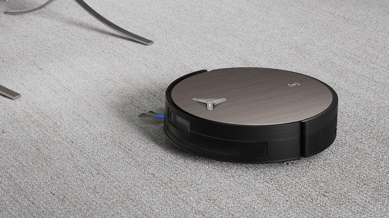 Ecovacs Deebot X11 Omnicyclone on a carpet