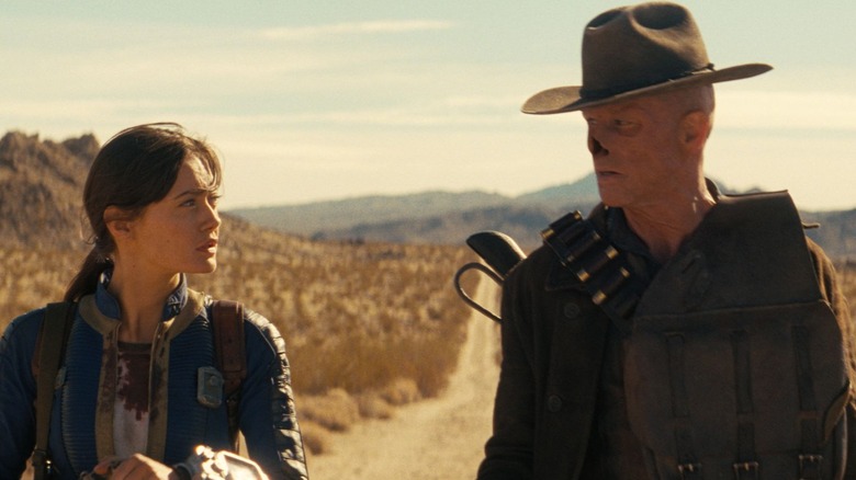 Lucy and the Ghoul walking and talking through the wasteland in 'Fallout' Season 2