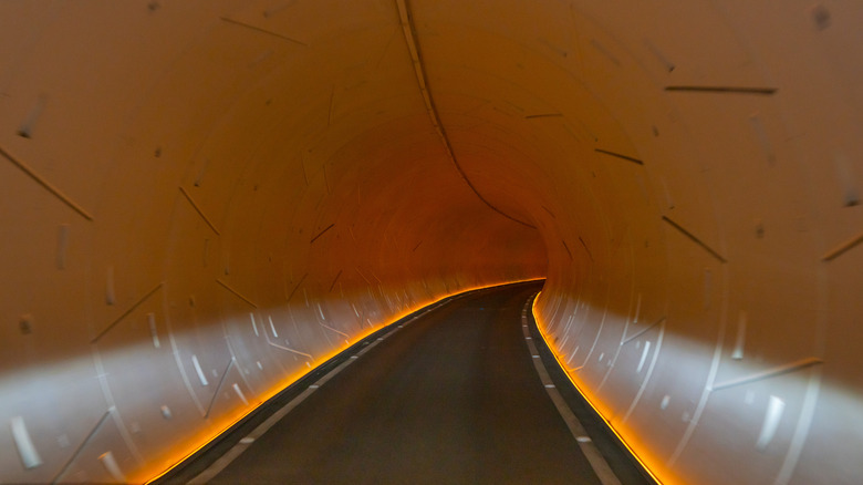 one of the Boring Company's underground tunnels lit in orange light