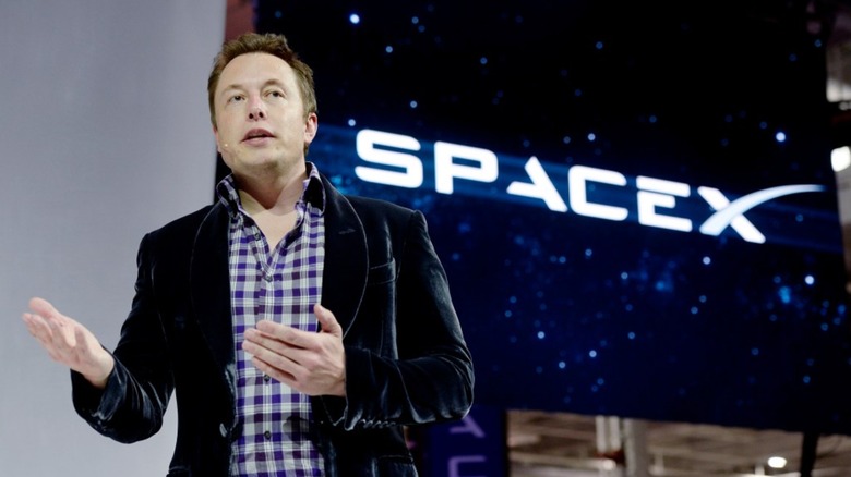 Elon musk unveiling the DragonV2 rocket