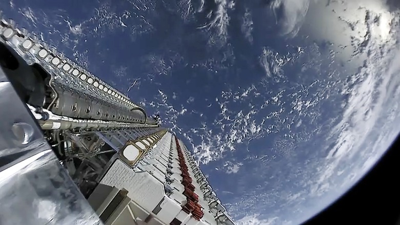 SpaceX satellites stacked together while in orbit around the Earth