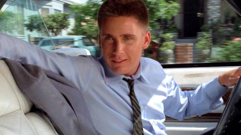 Otto (Emilio Estevez) sitting in a car in 