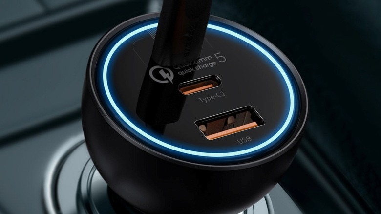 Baseus 160W USB-C Car Charger plugged into a car's 12V outlet with a connected USB-C cable