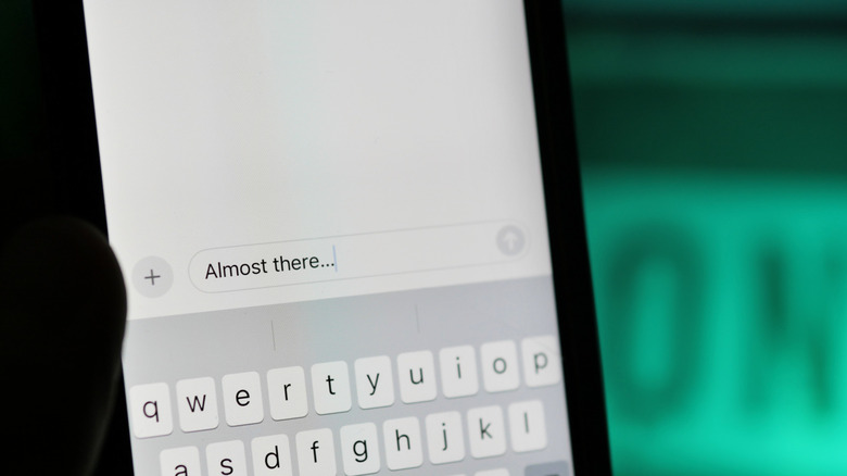 typing a message on an iphone that says 