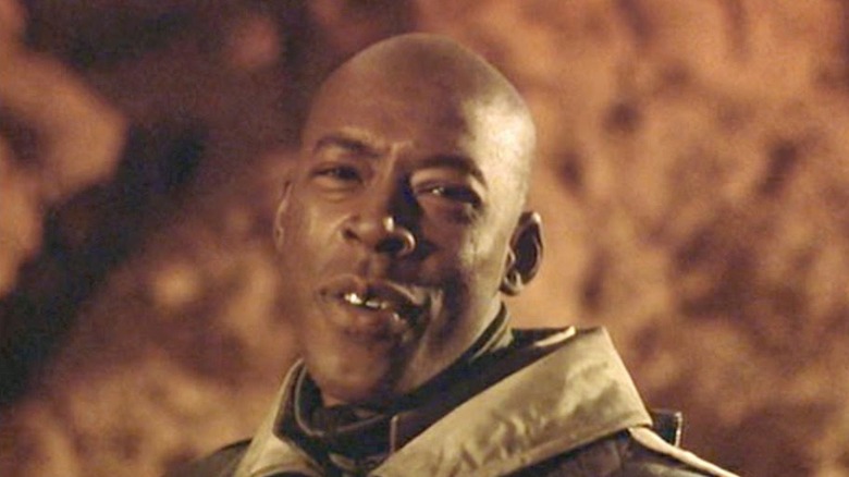 Washington (Ernie Hudson) smiling in 