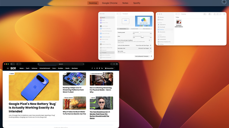 The Finder, Safari, and System Preferences app windows visible in the Mission Control interface.