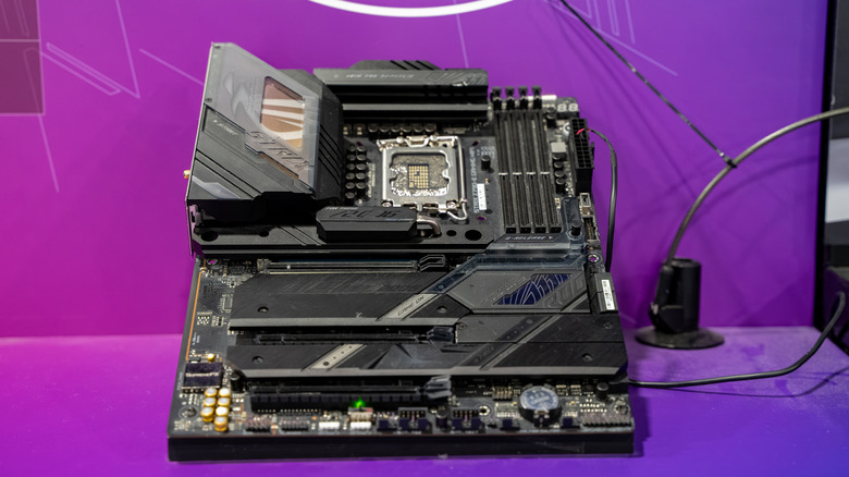A close-up on a high-end ASUS gaming motherboard.