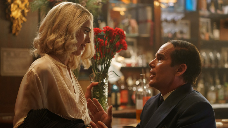 Margaret Qualley talks down to the diminutive Ethan Hawke.