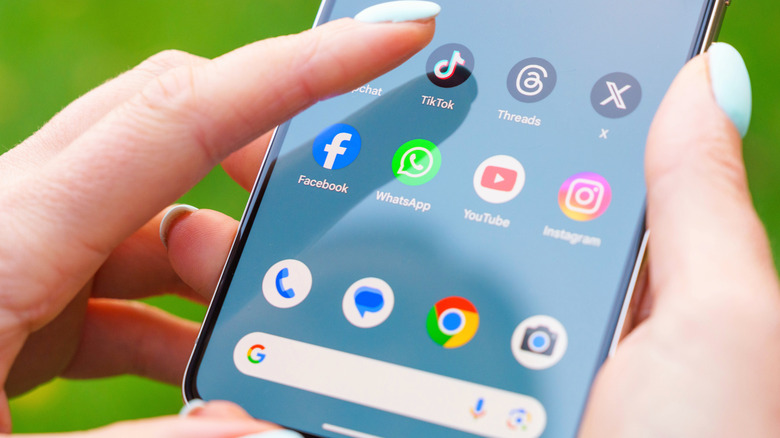 Close-up on the screen of a Google Pixel 8 Pro smartphone, as the user selects an app from the touchscreen.