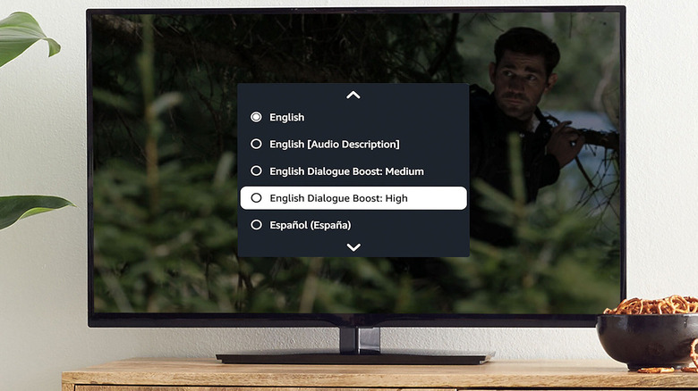 A TV showing the Dialogue Boost menu and language options