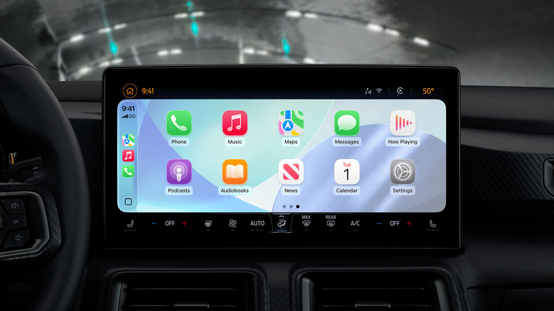 A car dash showing Apple CarPlay with a light theme.
