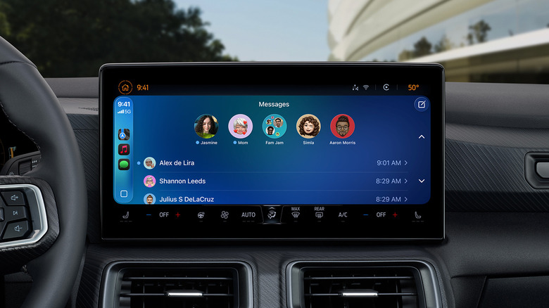 Apple CarPlay on a screen in a vehiclw showing pinned conversations.