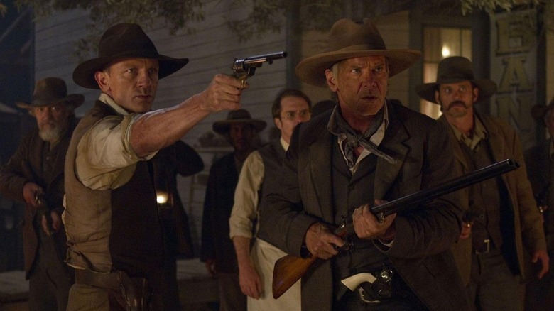 Daniel Craig and Harrison Ford armed in Cowboys and Aliens