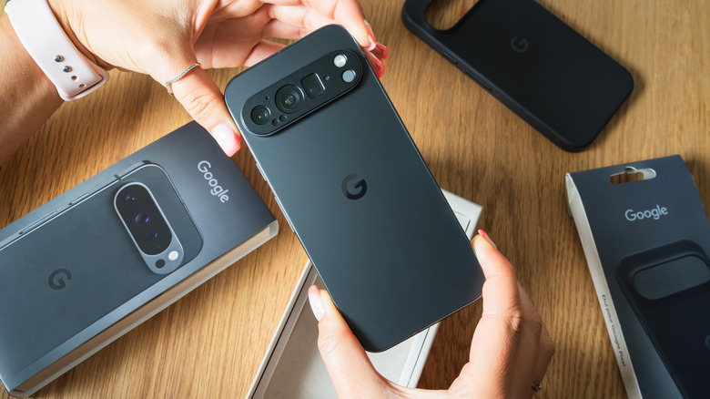Person holding black Google Pixel smartphone
