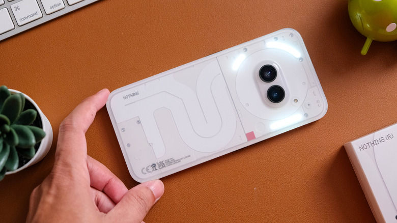 White Nothing Phone 2(a) on table