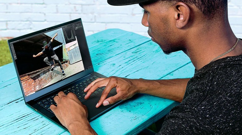 A man using his Razer Blade