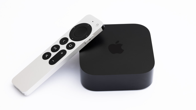 Apple TV 4K 3rd gen with its remote