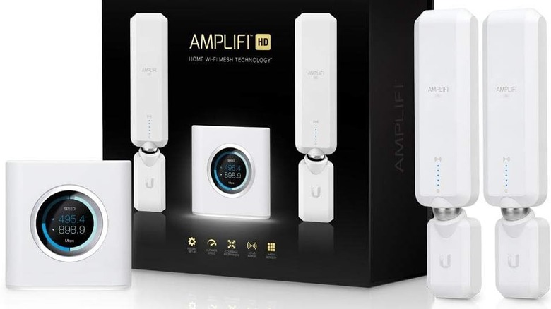 Ubiquiti AmpliFi Wi-Fi mesh system next to its box on a white background