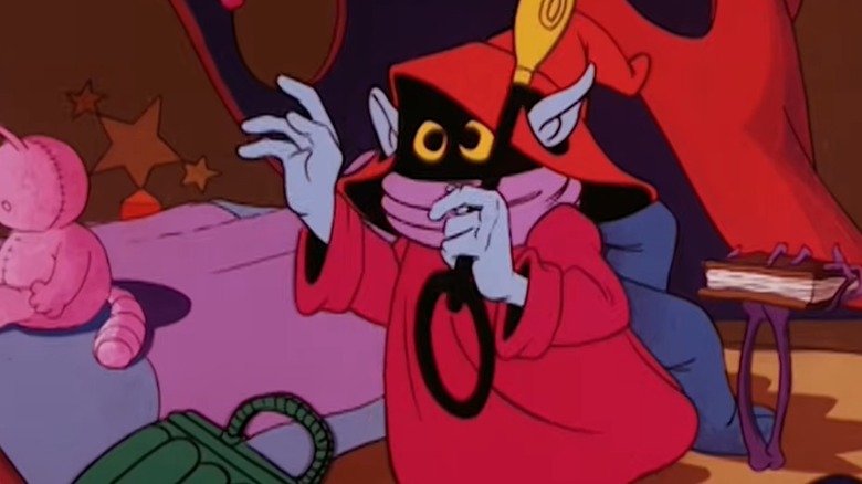 Orko holding a wand in He-Man and the Masters of the Universe