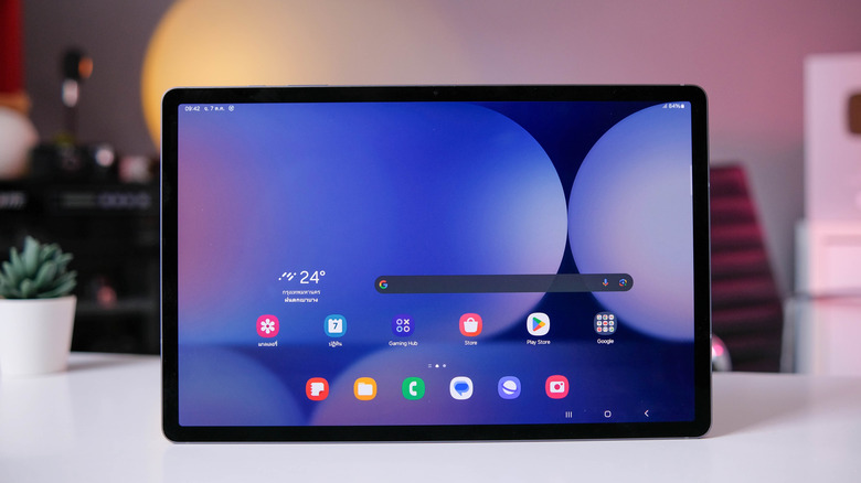 Samsung Galaxy S10+ propped on a atblet