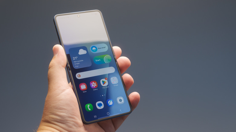 The Galaxy Z Flip 7 in hand.