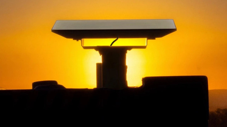 Starlink enterprise dish mounted with sunset in the background