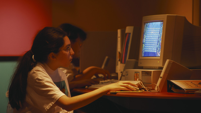 A girl using a PC in a computer lab