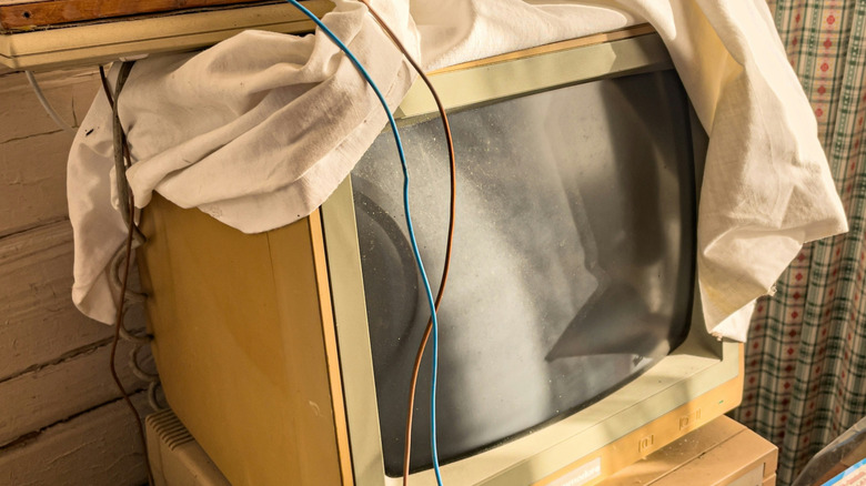 Old computer under tarp
