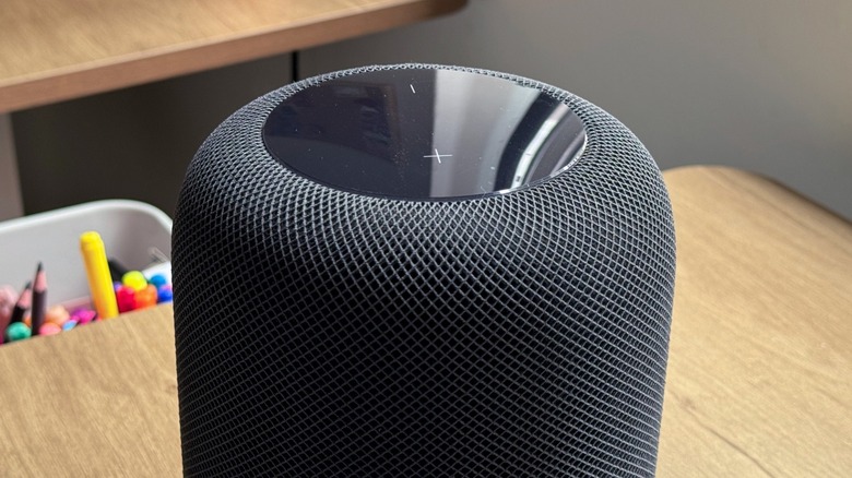 Close-up shot of the original HomePod on a table