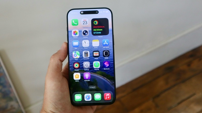 iOS 26 Home Screen with updated Liquid Glass icons