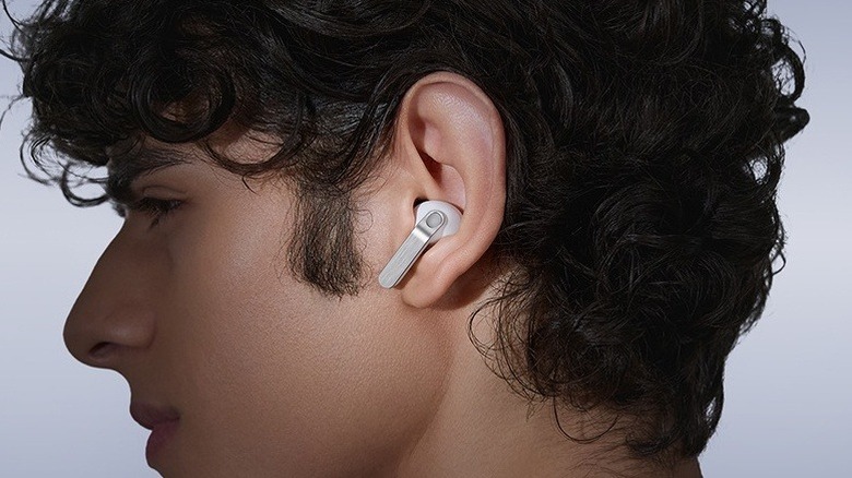 A person wearing the Galaxy Buds 4 Pro