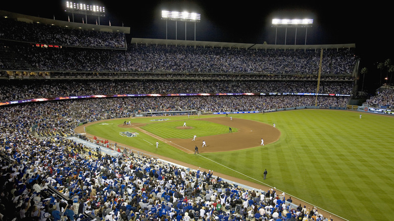 Stadium overlooking home plate and baseball game