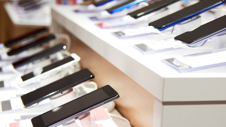 Smartphones on the counter of an electronics store