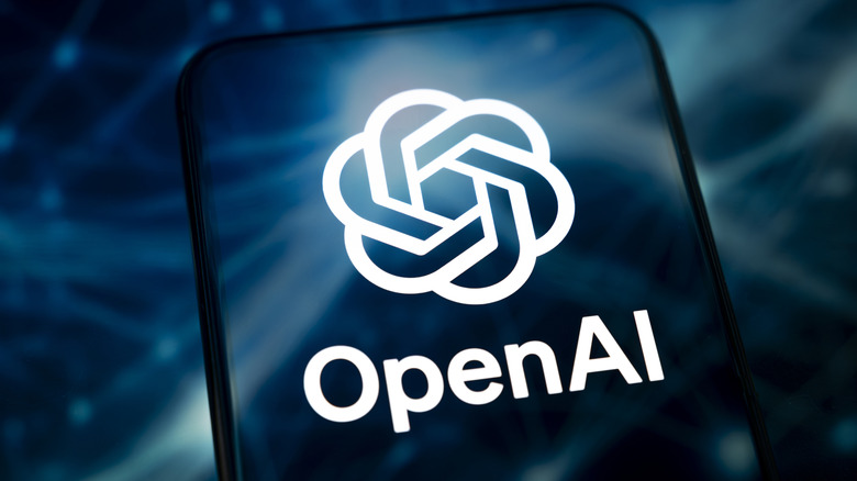 OpenAI logo on a smartphone with swirling blue and white and dark background