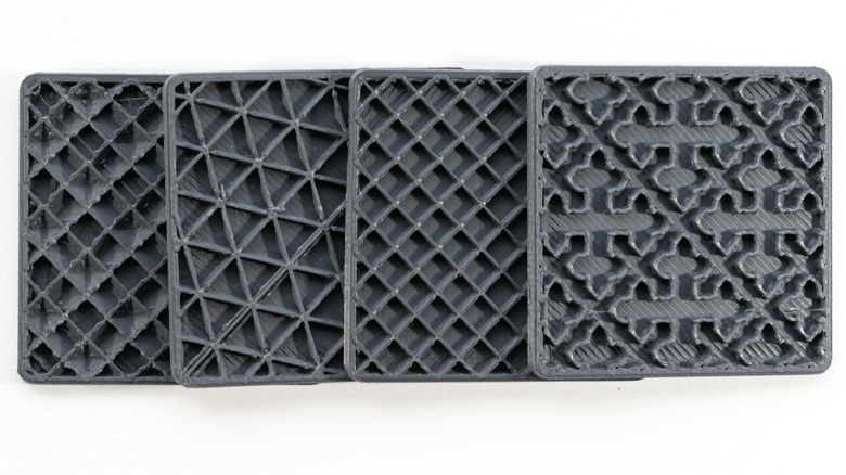 Several 3D printed sheets with different infill patterns.