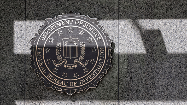 seal on FBI building that says DEPARTMENT OF JUSTICE, FEDERAL BUREAU OF INVESTIGATION